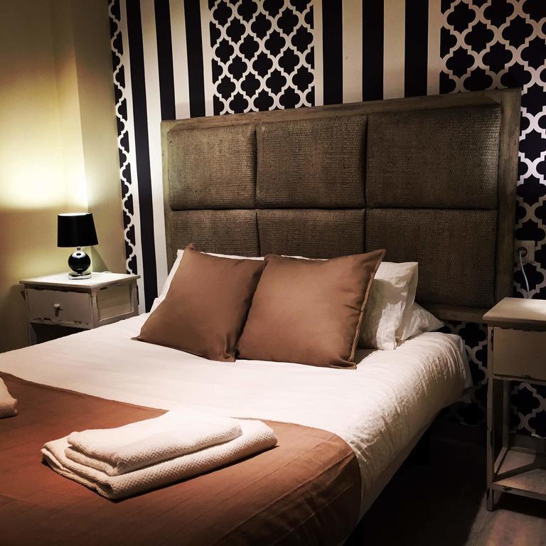 Ab Dominicum Apartamentos Малага Номер фото