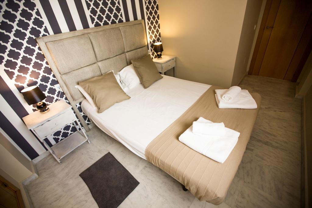 Ab Dominicum Apartamentos Малага Номер фото